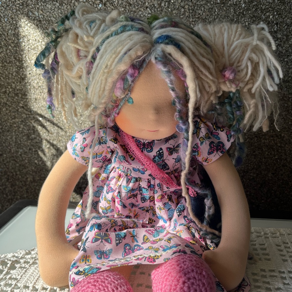 Whimsical Doll with Pink Butterfly Dress